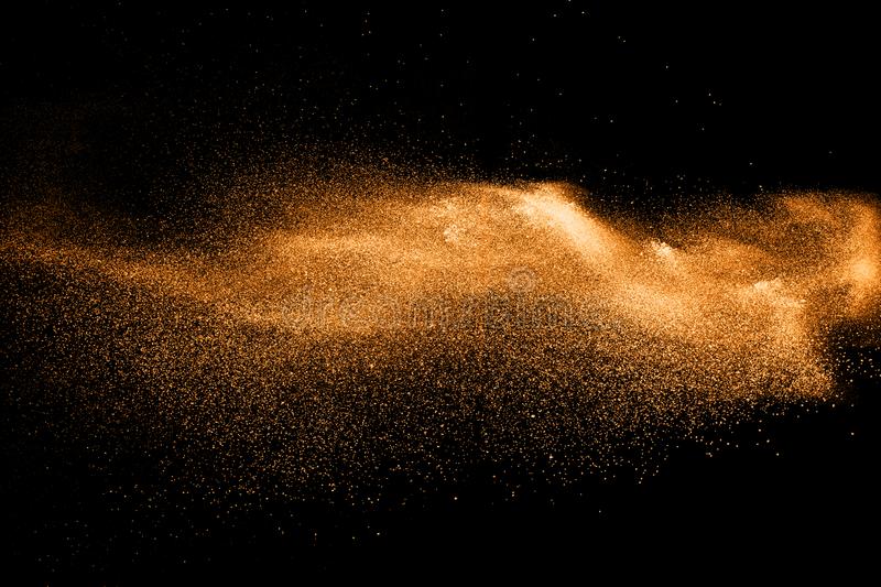 orange-dust-particles-explosion-black-background-color-powder-dust-splash-orange-dust-particles-explosion-black-background-125714874